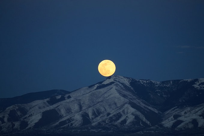 Moon over a mountain