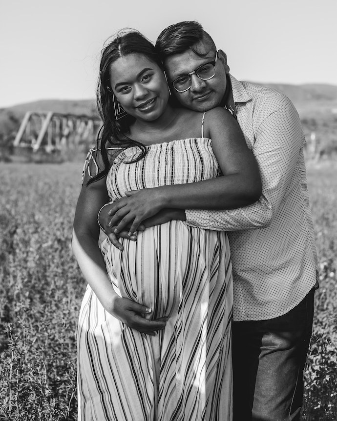 Pregnant woman with her man
