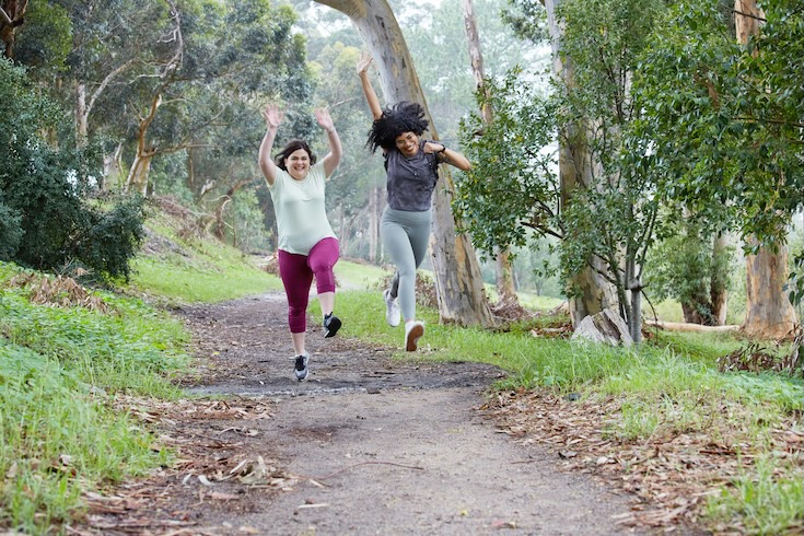 2 girls jumping