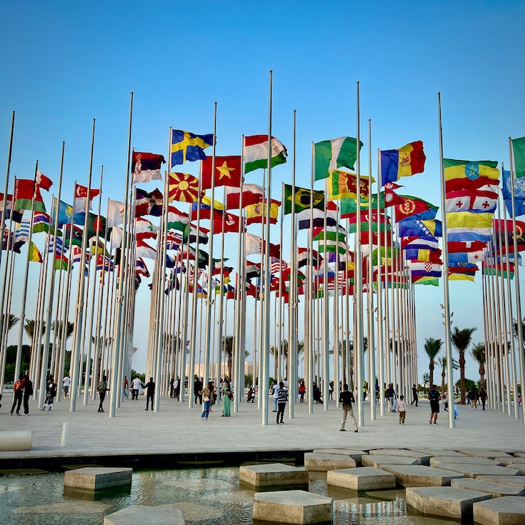 Flags of all countries fly outside in the wind