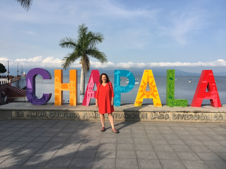 Rev. Alex in front of the CHAPALA sign