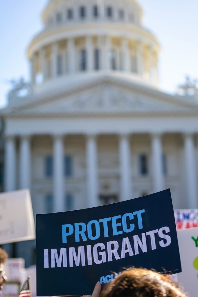 Protect Immigrants poster